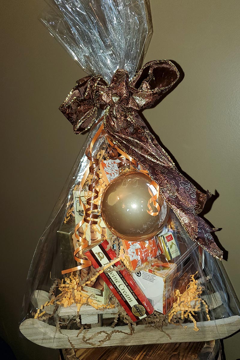 Gift basket wrapped with wine