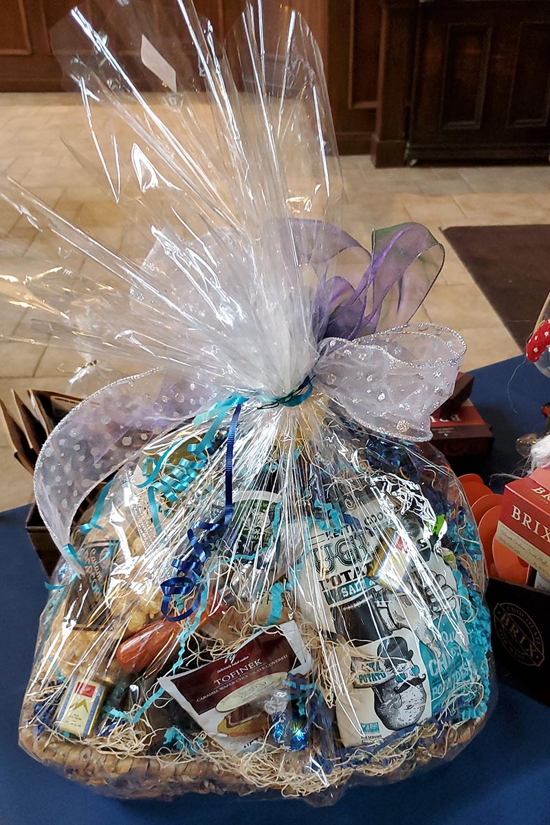 Gift basket of wine, chocolate and cookies