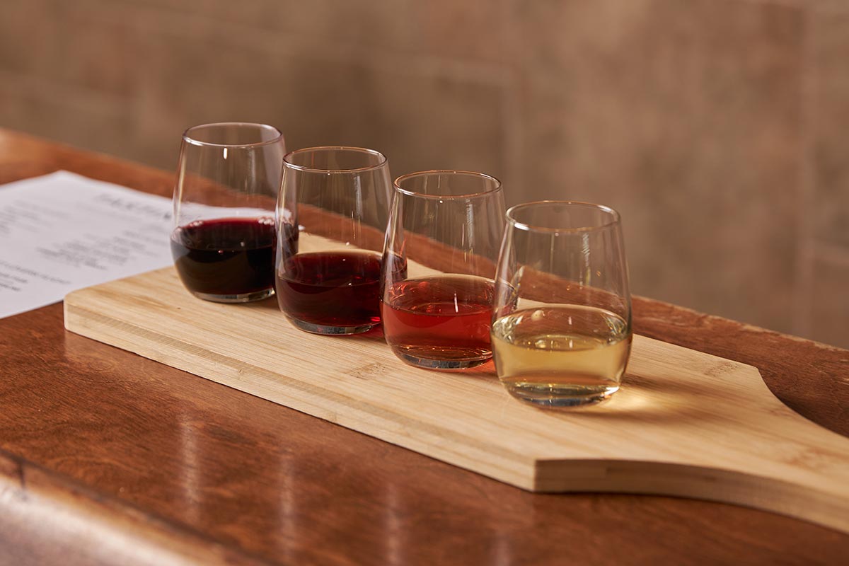 Wine tasting flight on wooden board